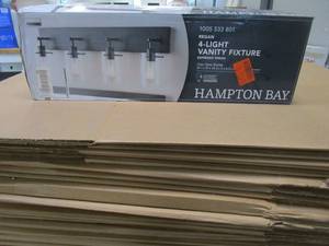lot 621 image: Hampton Bay Regan 29.13 in. 4-Light Espresso Bronze Bathroom Vanity Light with Clear Glass Shades (OPEN BOX)