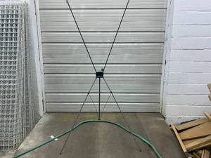 lot 99 image: 2 Hanger stands with storage sleeves.