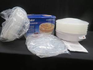 lot 18 image: OSTER FOOD DEHYDRATOR