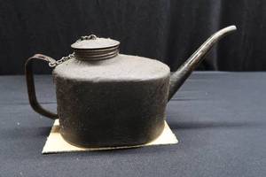 lot 43 image: ANTIQUE EAGLE RAILROAD OILER