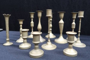 lot 61 image: LOT OF 12 VINTAGE BRASS CANDLE STICKS SERIOUS BRASS
