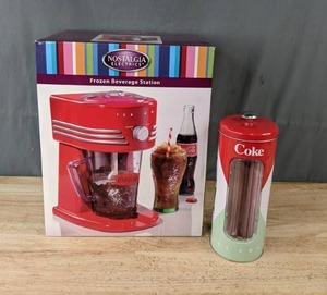 lot 113 image: NEW Nostalgia Electrics Coca-Cola Counter Top Frozen Beverage Station with Vintage Tin Straw Holder K