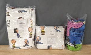lot 114 image: NEW The Peanuts Gang Bath Towel, Hand Towel and 65th Anniversary Throw Blanket K