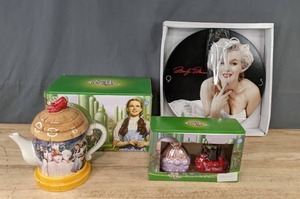 lot 123 image: NEW Wizard of Oz Teapot, Salt & Pepper Shaker, & Marilyn Monroe Cordless Wood Wall Clock K