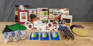 lot 105 image: NEW Kitchen Items and Cookbooks Rachael Ray Bench Scrape, Veggie Brush, Tongs, Measuing Cups, Bobby Deen, Meals on the Grill, and Much More  K
