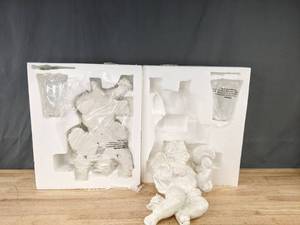 lot 107 image: NEW Ceramic Cherub with Glass Candle Holder (2) K
