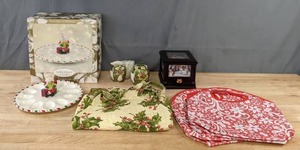 lot 135 image: Kathy Ireland Home by Gorham Once Upon a Christmas Deviled Egg Tray, Christmas Music Box, Christmas Apron, & More K