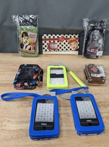 lot 139 image: Assortment of Phone Wristlets & An I Love Lucy Wallet Marilyn Monroe, Breakfast at Tiffanys, & More K