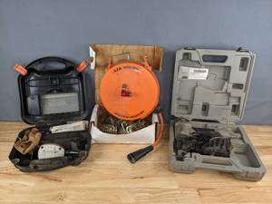 lot 76 image: Pneumatic Porter Cable Roof Coil Nailer, Air Palm Nailer, and Air Hose B