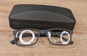 lot 183 image: New Flexon Eyeglasses with Display Lenses and Black Case L