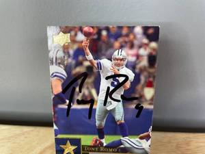 lot 54 image: Tony Romo Autographed 2009 Upper Deck NFL Football Card Dallas Cowboys I