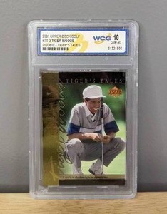 lot 40B image: WCG Graded 10 Tiger Woods 2001 Upper Deck Golf Rookie Tigers Tales Card #TT3 V