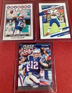 lot 99 image: (3) Tom Brady Cards