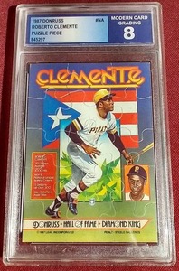 lot 105 image: 1987 Donruss Roberto Clemente Puzzle Card - Graded 8