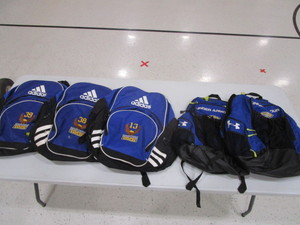 lot 364 image: (3) Adidas (2) Under Armour Backpacks