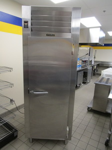 lot 373 image: Reach Through 2 Door Upright Freezer 30x32x83 (not cooling very well, needs repair)