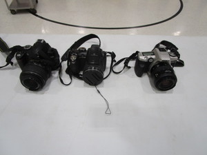 lot 401 image: Minolta, Fuji Film, Nikon Cameras