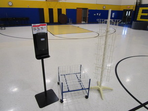 lot 426 image: Rolling Metal Storage, Hand Sanitizer Station, Rotating Card Rack