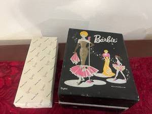 lot 80 image: Barbies, Barbie Case & Heirloom Doll