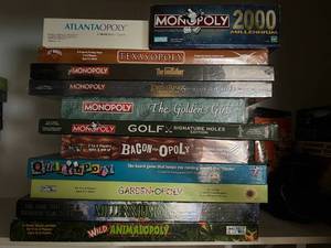 lot 151 image: 12 Monopoly Game Variations - Some New Sealed