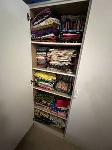 lot 242 image: Cabinet Full of Fabric