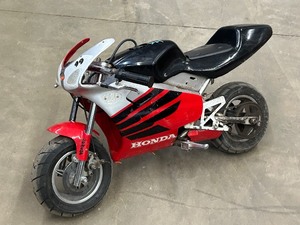 lot 7 image: Gas-Powered Pocket-Rocket Miniature Motorcycle