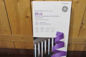 lot 7 image: GE Energy Smart Random Sparkle LED 20pc Twinkling Ice Crystal Icicle Set, Crystal White - 9.5 Feet