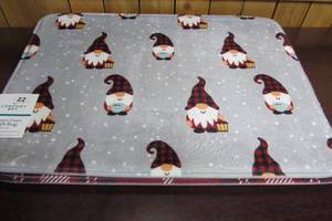 lot 22 image: Three Holiday Memory Foam Bath Rugs