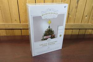 lot 57 image: Wondershop At Target LED Lit Rotating Tree Topper