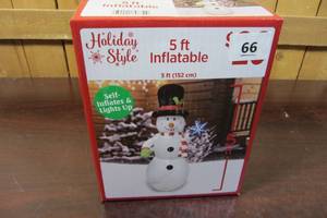 lot 66 image: Holiday Style - 5 Foot Inflatable Snowman