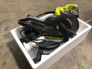 lot 9 image: RYOBI 9 Amp Corded 7-14 in. Compound Miter Saw  Customer Returns See Pictures