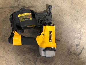 lot 48 image: DEWALT Pneumatic 15-Degree Coil Siding Nailer  Customer Returns See Picutures