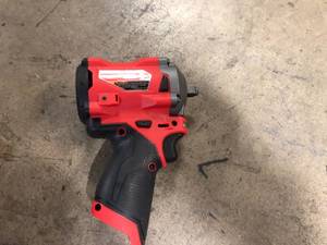 lot 53 image: Milwaukee M12 FUEL 12V Lithium-Ion Brushless Cordless Stubby 38 in. Impact Wrench (Tool-Only)     Customer Returns See Picutures