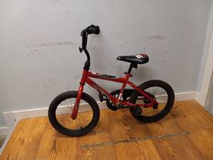 lot 94 image: HUFFY ROCK IT BOYS BIKE
