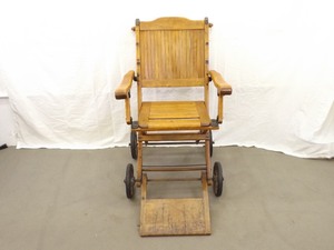 lot 2 image: Antique Childs Wood Wheelchair