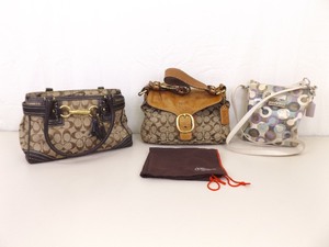 lot 96 image: Vintage Authentic COACH Signature Handbags