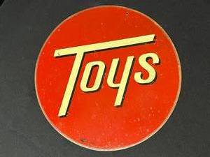 lot 27 image: Candy & Toys Metal Sign By Mummert Sign Co.