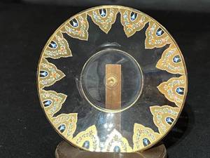lot 78 image: Ornately Painted Tea Cup and Saucer with Stand