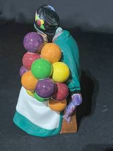 lot 60 image: Royal Doulton -The Old Balloon Seller Figurine - HN 1315