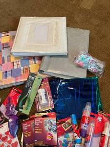 lot 106 image: Scrapbooking Items Photo albums, glue, punches, foam layering tape, pliers and more