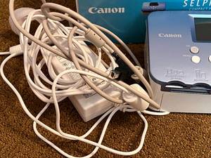 lot 108 image: Canon Selphy Cp760, Xyron 5 Creative Station and Sephy CP Color InkPaper Set
