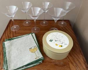 lot 54 image: Martini Glasses, Napkins and Set of Martini Signature Plates