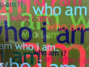 lot 37 image: Who Am I Acrylic Wall Hanging