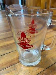 lot 139 image: Lot of Marbles in Grain Bell Beer Pitcher