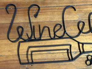 lot 133 image: Metal Wine Cellar Wall Hanging