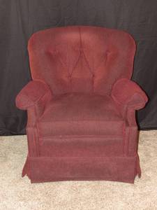 lot 37 image: Burgundy upholstered chair swivel base rocker with 1 throw pillows