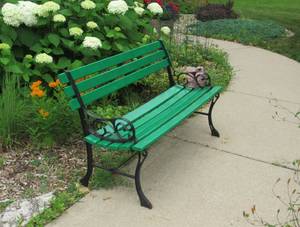 lot 133 image: Green painted ceder park bench with wrought iron sides