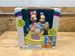 lot 91 image: DISNEY Mickey and Minnie Musical Crib Rocker