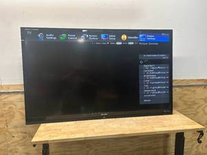 lot 12 image: SHARP LC-70LE732U AQUOS 70 1080p LED TV with Remote