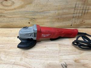 lot 101 image: MILWAUKEE 11 Amp Corded 4-12 in. Small Angle Grinder with Lock-On Paddle Switch